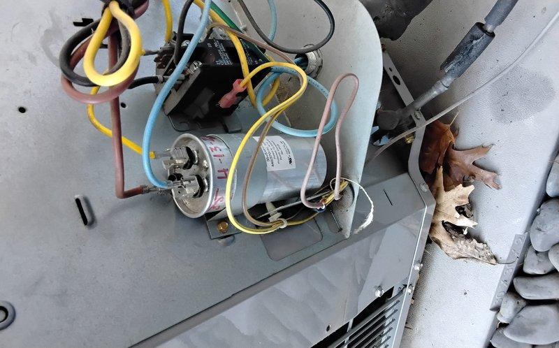 Completed spring clean and check maintenance service on two air conditioning systems per comfort plan agreement. Performed comprehensive inspection of both units, including examination of capacitors, evaporator coils, electrical connections, and refrigerant lines. Evaporator coil showed accumulation of dust and debris, which was addressed during the cleaning process. Verified proper electrical connections with multiple wire terminations to capacitors, checked all wire nuts for secure connections, and inspected condition of insulation materials throughout both systems. All components photographed and documented for service records, with both systems restored to proper operating condition upon completion of maintenance procedures.