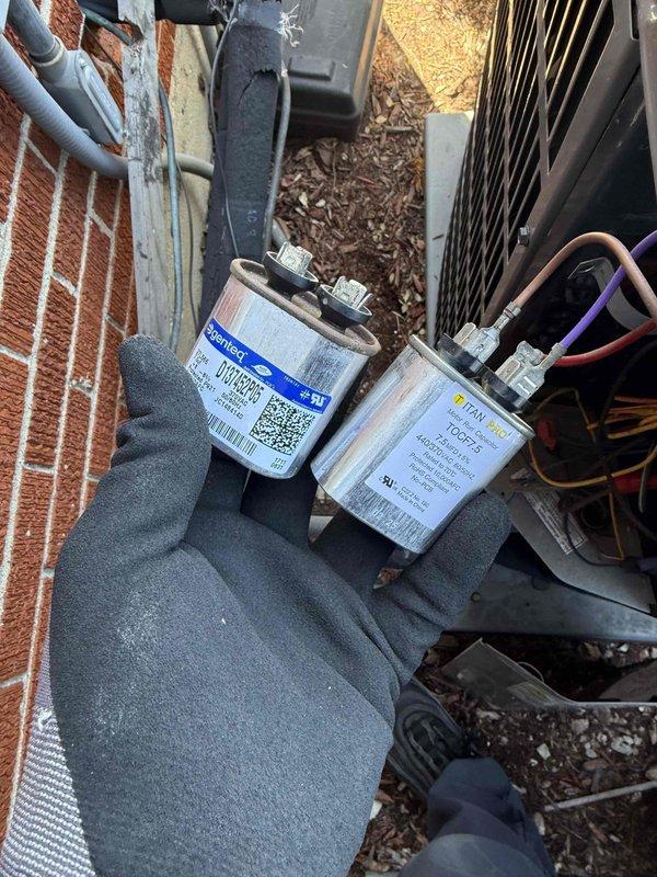 Replaced defective capacitor on Platinum series furnace system. Removed failed GE capacitor and installed new TITAN PRO TOCF10 replacement unit with proper voltage and amperage specifications to restore system functionality.