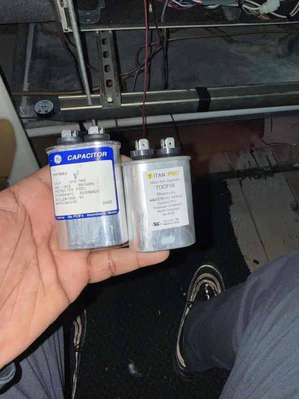 Replaced defective capacitor on Platinum series furnace system. Removed failed GE capacitor and installed new TITAN PRO TOCF10 replacement unit with proper voltage and amperage specifications to restore system functionality.