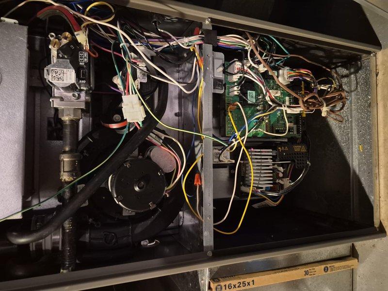 Completed comprehensive air conditioning tune-up and clean-and-check service on residential 2.5-ton split system. Performed thorough inspection of outdoor condenser unit, verified proper operation of fan motor and compressor, cleaned condenser coils and checked refrigerant levels. Inspected indoor air handler components including blower assembly, control boards, gas valve connections, and all electrical wiring for proper connections and operation. All system components found operating within normal parameters with no deficiencies noted.