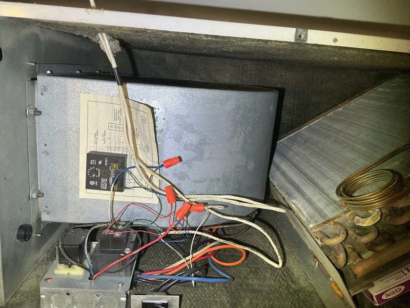 Completed comprehensive tune-up maintenance on residential air conditioning and air handler system. Performed thorough inspection of electrical components, control board, and wiring connections within the air handler unit. Removed and inspected heavily soiled pleated air filter showing significant dust and debris accumulation; filter required replacement to maintain proper airflow and system efficiency. Examined blower assembly and ductwork connections for proper operation. Verified all electrical connections, wire terminations, and control module functionality. System operational and running within normal parameters upon completion of maintenance service.