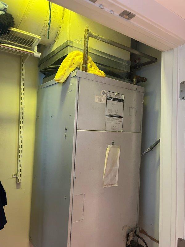 Conducted on-site evaluation of existing 3-ton air conditioning system and air handler unit located in interior utility closet. Assessed current equipment condition, measured available space for replacement units, documented existing ductwork connections and electrical service, and photographed equipment specifications and installation configuration. Provided comprehensive replacement estimate for new 3-ton AC condenser and matching air handler system.