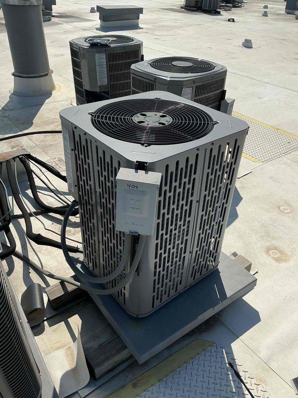 Completed commercial preventive maintenance per contract on three rooftop HVAC condensing units. Performed comprehensive inspection of all equipment, verified proper operation, and measured electrical amperage at 95.4A on active unit. All systems operating within normal parameters with no deficiencies noted.