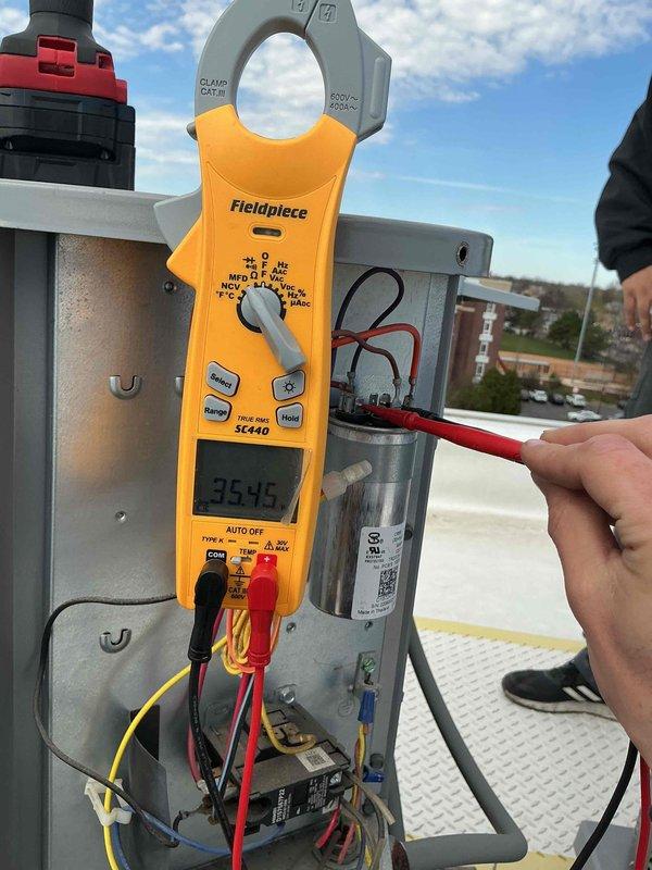 Completed commercial preventive maintenance per contract on three rooftop HVAC condensing units. Performed comprehensive inspection of all equipment, verified proper operation, and measured electrical amperage at 95.4A on active unit. All systems operating within normal parameters with no deficiencies noted.