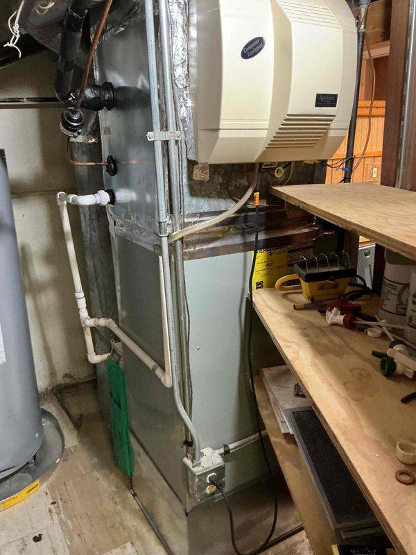 Performed comprehensive Comfort Plan maintenance on a single-system American Standard HVAC unit. Conducted complete clean and check procedure including inspection of furnace/air handler, condensate drain lines, humidifier system, and all associated components. Verified proper operation of heating and cooling system, checked electrical connections, inspected ductwork connections, and confirmed condensate drainage functionality. All equipment found operating within normal parameters and system ready for continued service.