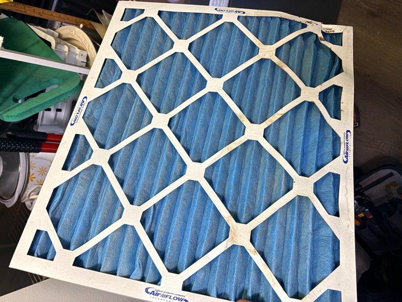 Performed routine maintenance tune-up on single HVAC system. Replaced 18x20x1 air filter with new pleated media filter to ensure proper airflow and system efficiency. Verified thermostat operation showing 79°F cooling mode at time of service, with all display functions and controls operating normally.