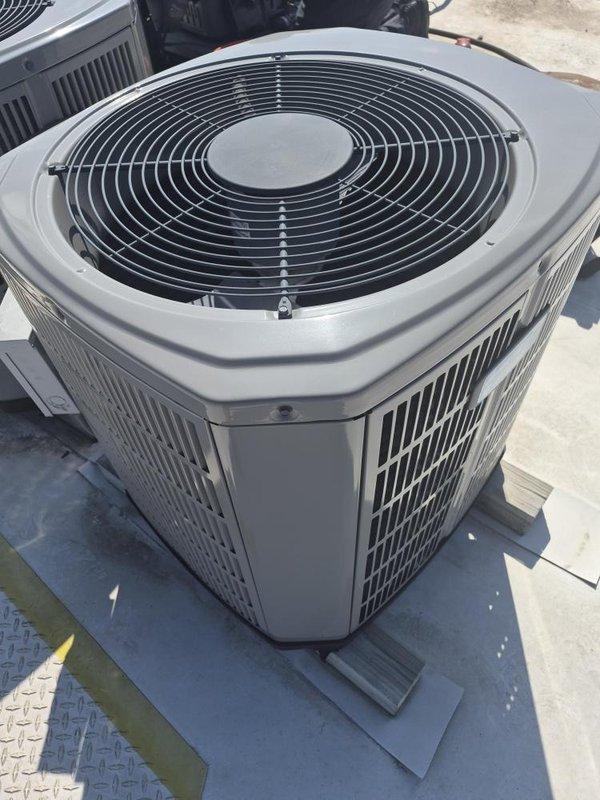 # HVAC Tune-Up Service Completed

Performed comprehensive tune-up and maintenance on single-system air conditioning unit. Inspected outdoor condensing unit, which showed good overall condition with clean exterior surfaces and proper installation on rooftop platform. Conducted electrical diagnostics using clamp meter to verify system amperage and performance parameters. Replaced 12x20x1 air filter to ensure proper airflow and system efficiency. Unit tested and confirmed operational.