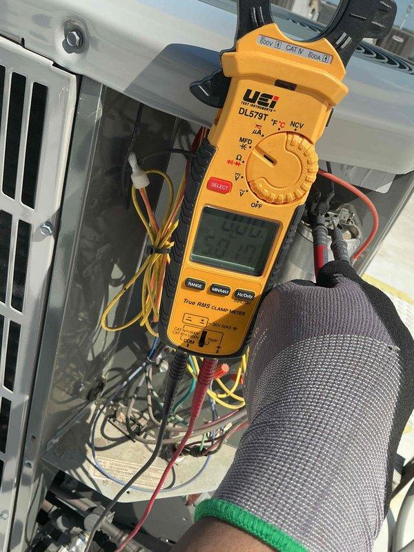 Completed comprehensive tune-up service on single HVAC system including air conditioning and air handler units. Replaced dirty 12x20x1 air filter that showed significant dust and debris accumulation, restoring proper airflow to the system. Performed electrical diagnostics and measurements on system components using calibrated multimeter to verify proper voltage and amperage readings, ensuring all electrical connections and controls are functioning within manufacturer specifications.