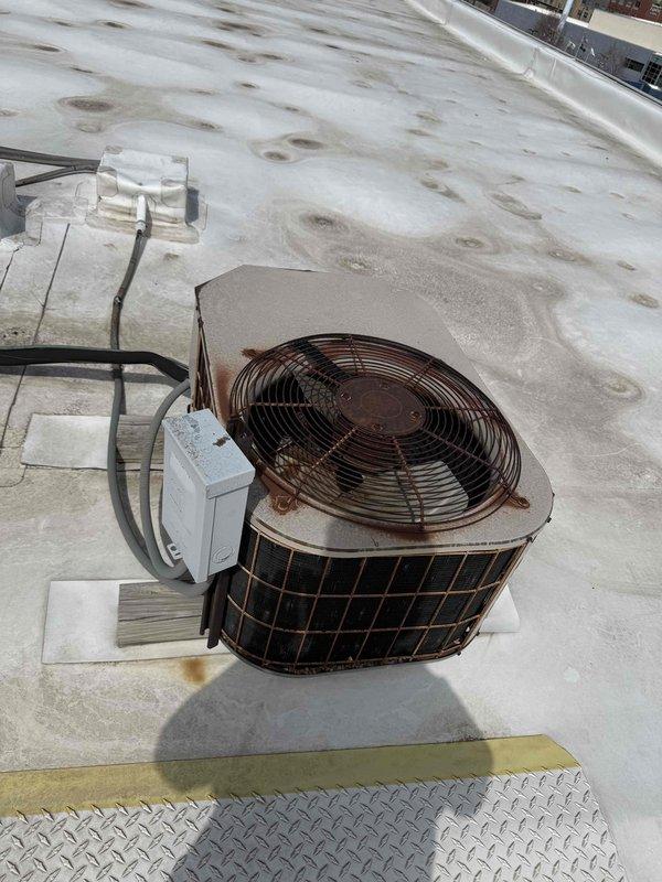Performed scheduled commercial preventive maintenance inspection on rooftop air conditioning unit per service agreement. Conducted electrical diagnostics using clamp meter, verified capacitor operation at 5mfd rating, and inspected all electrical connections and components. Unit found operating within normal parameters with all systems functioning properly.