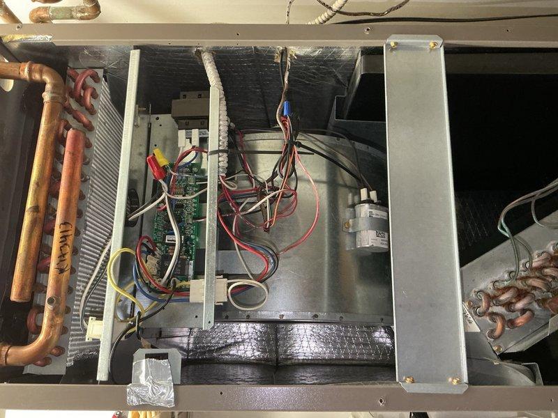 Completed standard tune-up maintenance on single-system HVAC unit. Performed comprehensive inspection of air handler and condensing unit, documenting equipment condition with photos showing evaporator coil with accumulated dirt and debris, oxidized copper refrigerant lines with visible patina, control board, blower assembly, and internal components. System operational at time of service. Customer maintains their own filtration.