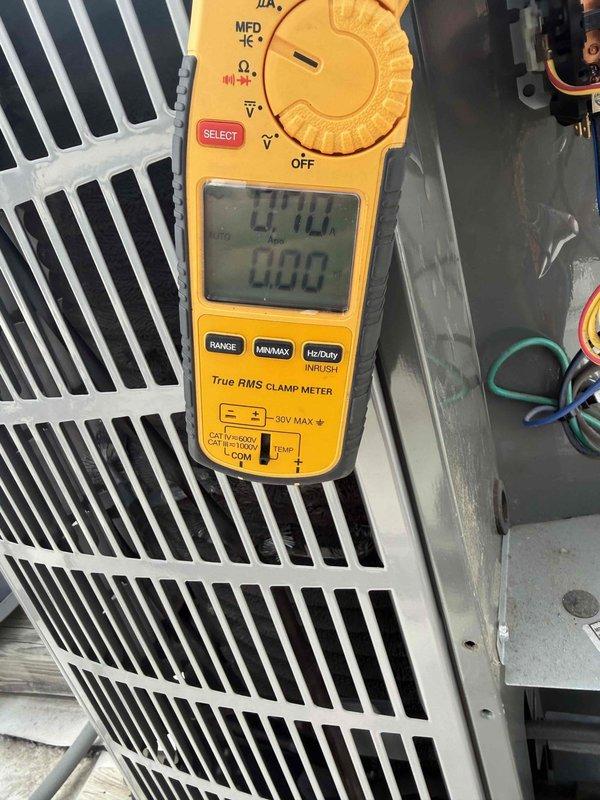 Performed commercial air conditioning clean and check maintenance per service agreement. Conducted electrical diagnostics using digital clamp meter, verifying system amperage and capacitance readings on outdoor condensing unit. Inspected all electrical connections, wiring, and components for proper operation and documented equipment conditions with photos for service records.