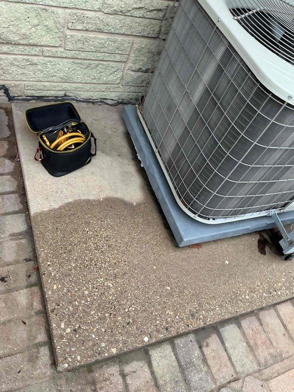Performed comprehensive Comfort Plan clean and check maintenance on single-system residential air conditioning unit. Inspected outdoor condenser unit with protective cage enclosure mounted on concrete pad, verified proper operation and clearances. Accessed attic-mounted air handler, inspected evaporator coil assembly, checked condensate drain lines and PVC drainage system for proper flow and connections. All components operating within normal parameters, system ready for cooling season.