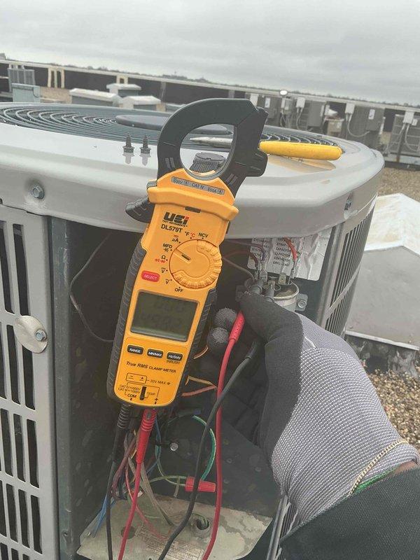 Completed preventive maintenance tune-up on rooftop HVAC system. Performed comprehensive electrical diagnostics using clamp meter, measuring amperage draw of 242A and verifying proper voltage levels across all components. Inspected and tested contactor, relay, and associated wiring connections. Replaced 12x20x1 air filter. All electrical parameters within manufacturer specifications, system operating efficiently with no deficiencies noted.