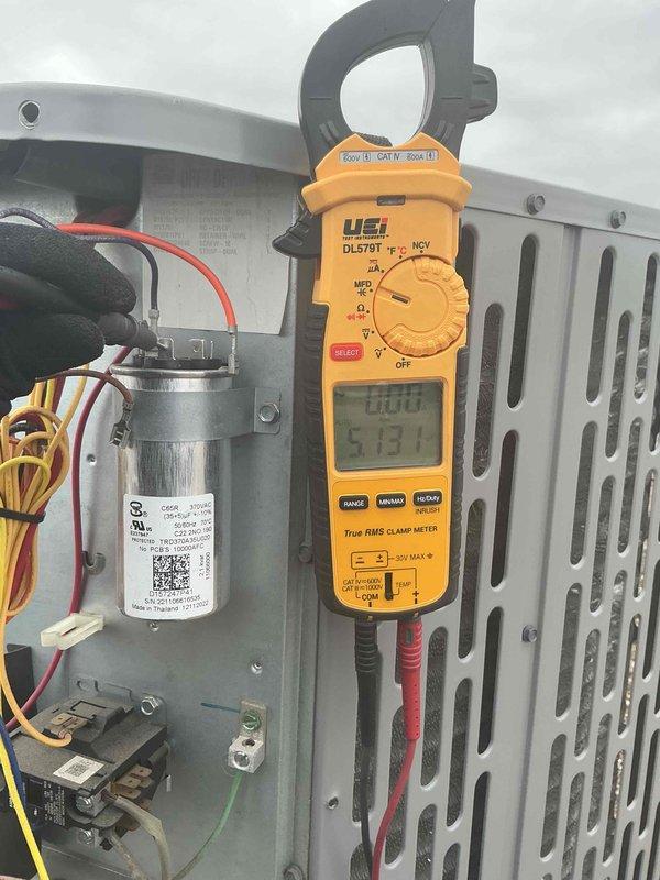 Completed comprehensive tune-up on single-system HVAC unit, performing electrical diagnostics using clamp meter and multimeter to verify proper amperage draw and voltage readings across all components. Tested capacitor functionality, inspected all electrical connections, and installed 12x20x1 air filter to ensure optimal system performance and airflow.