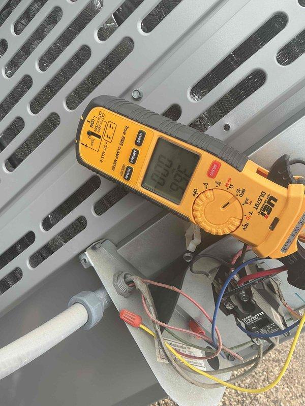 Completed comprehensive tune-up on single-system HVAC unit, performing electrical diagnostics using clamp meter and multimeter to verify proper amperage draw and voltage readings across all components. Tested capacitor functionality, inspected all electrical connections, and installed 12x20x1 air filter to ensure optimal system performance and airflow.