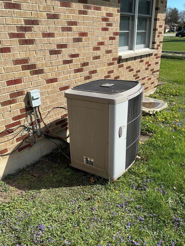 Completed preventative maintenance clean and check on residential air conditioning system per comfort plan agreement. Performed comprehensive inspection of outdoor condensing unit, including evaluation of electrical components with contactor removed and examined for proper operation. Verified system operation, checked refrigerant levels, cleaned condenser coils, and confirmed proper drainage through condensate line. Unit found in good working condition with all components functioning within manufacturer specifications.