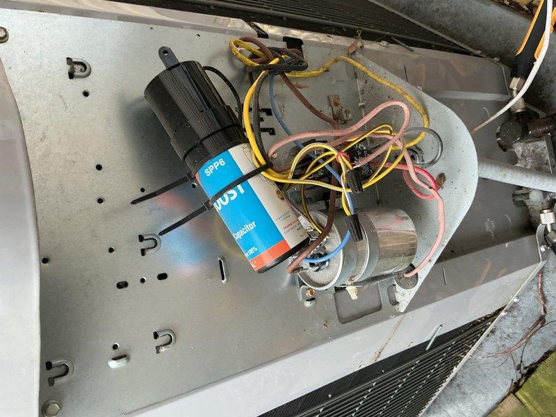 Completed annual air conditioning clean and check maintenance per comfort plan agreement. Performed comprehensive system inspection including electrical connections, capacitor testing, and component examination. All electrical terminals, contactors, and wiring connections were inspected and found to be secure and properly configured. Verified proper capacitor operation and refrigerant line integrity throughout the system.