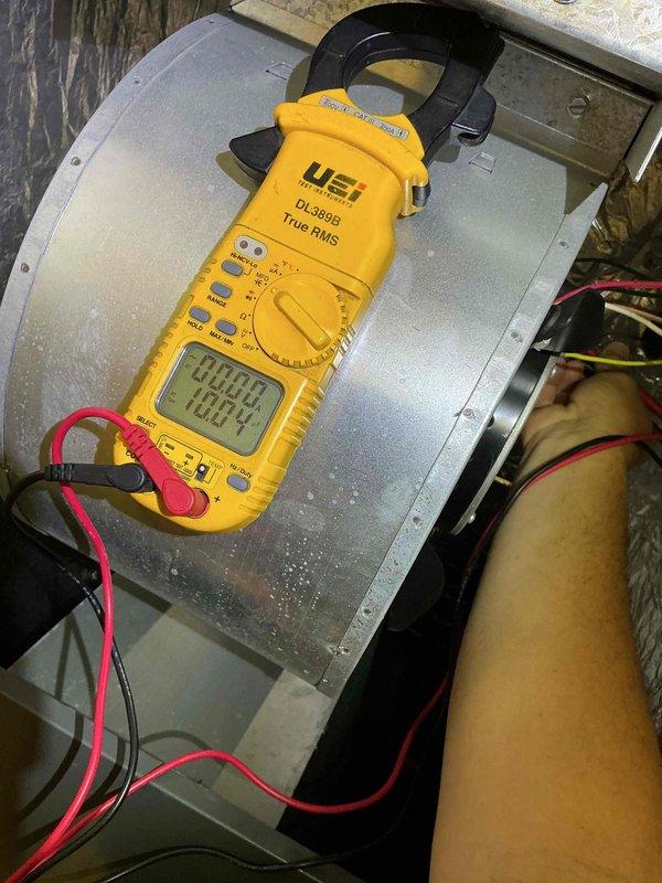 Completed comprehensive tune-up and maintenance service on residential air conditioning and air handler system. Performed full system inspection, electrical testing with digital multimeter, and verified proper operation of all components. System found to be clean and clear with no deficiencies noted; customer declined filter replacement at time of service.