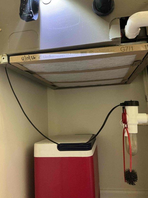 Completed comprehensive tune-up on residential air conditioning system with air handler. Performed standard maintenance inspection of all components, replaced air filter as requested, and documented system operation with temperature readings showing proper performance at 262.5°F on discharge piping. Verified condensate pump operation, checked electrical connections, and confirmed all mechanical and plumbing components functioning within normal parameters.