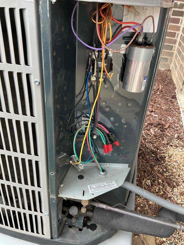 Performed comprehensive spring clean and check maintenance on air conditioning system and air handler as part of annual Comfort Plan service. Inspected outdoor condensing unit, verified electrical connections and wiring integrity, tested capacitor function, and examined refrigerant line connections. Evaluated indoor air handler in attic space, confirmed proper operation of heating elements, inspected ductwork connections, and verified condensate drain system functionality. All components found operating within normal parameters with no deficiencies noted.
