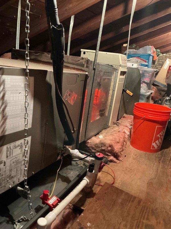 Performed comprehensive spring clean and check maintenance on air conditioning system and air handler as part of annual Comfort Plan service. Inspected outdoor condensing unit, verified electrical connections and wiring integrity, tested capacitor function, and examined refrigerant line connections. Evaluated indoor air handler in attic space, confirmed proper operation of heating elements, inspected ductwork connections, and verified condensate drain system functionality. All components found operating within normal parameters with no deficiencies noted.