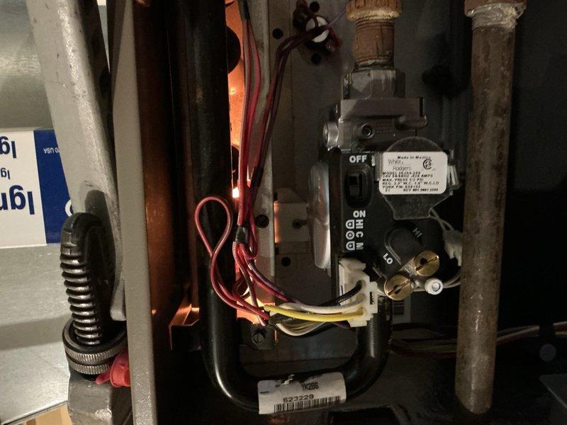 Replaced failed 2-stage gas valve on Luxaire furnace. Disconnected electrical connections and gas supply lines, removed old valve assembly showing signs of corrosion, and installed new gas valve unit. Reconnected all wiring to proper terminals, restored gas supply connections, and verified proper operation of ignition sequence and flame control.