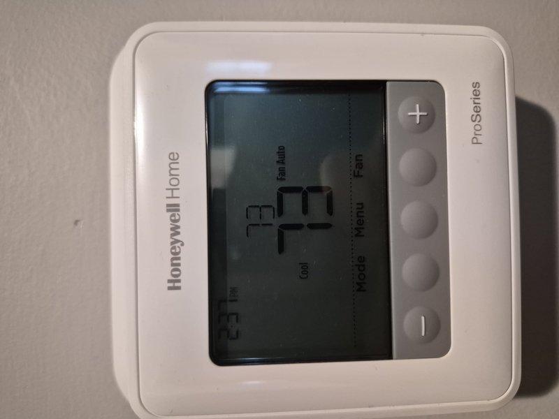Completed annual air conditioning clean and check maintenance per comfort plan agreement. Performed comprehensive system inspection including thermostat functionality verification, air filter assessment, and standard preventive maintenance procedures. Thermostat operating properly at 72°F with fan set to auto mode. Filter showed moderate dust accumulation consistent with normal usage and remains serviceable. System operating within normal parameters with no deficiencies noted.