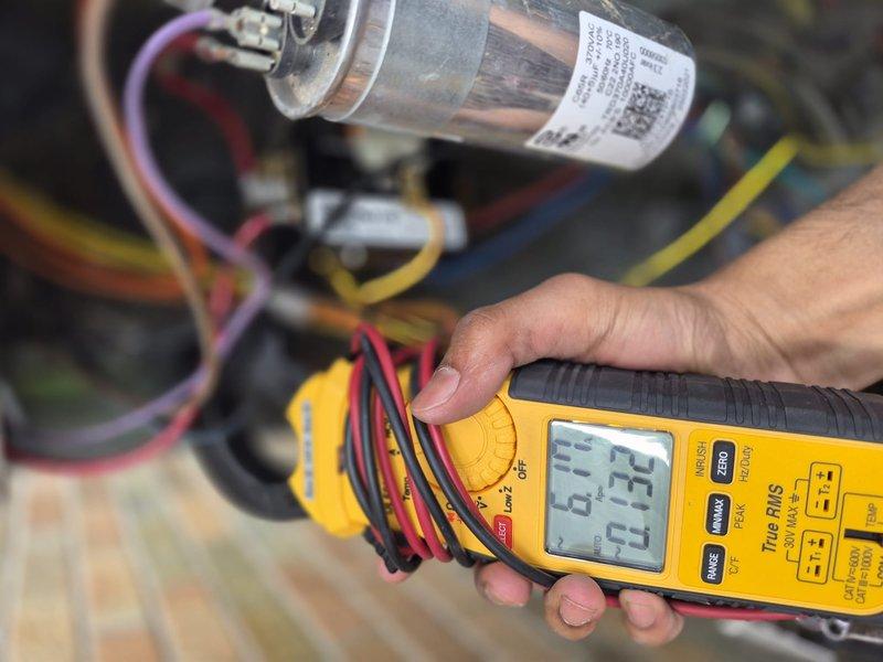 Completed preventive maintenance clean and check on air conditioning system per service comfort plan. Performed comprehensive electrical diagnostics using digital multimeter, measuring voltage and amperage at capacitor and key electrical components to verify proper system operation. All readings within manufacturer specifications; system operating efficiently with no deficiencies noted.