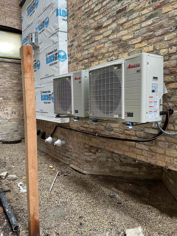 Responded to callback for second floor air conditioning system that was inoperative. Upon inspection, found UltraZone control system displaying "VAS Sensor BAD!" error on LCD screen. Diagnosed failed velocity air sensor preventing proper zone operation. Replaced defective sensor and verified dual Amana outdoor units were functioning correctly with proper communication to zone control board. System restored to full operation with all zones cooling properly.