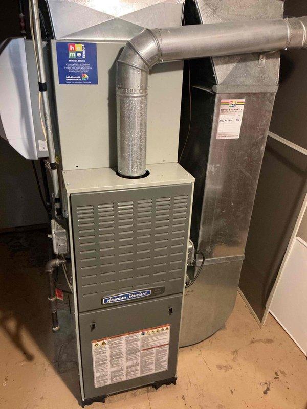 Completed spring preventative maintenance on American Standard HVAC system per comfort plan protocol. Performed thorough clean and check of air conditioning unit, inspected blower motor assembly and heat exchanger components, verified all electrical connections and wiring were secure, and documented system condition with interior and exterior photographs. All components operating within normal parameters with no deficiencies noted at time of service.