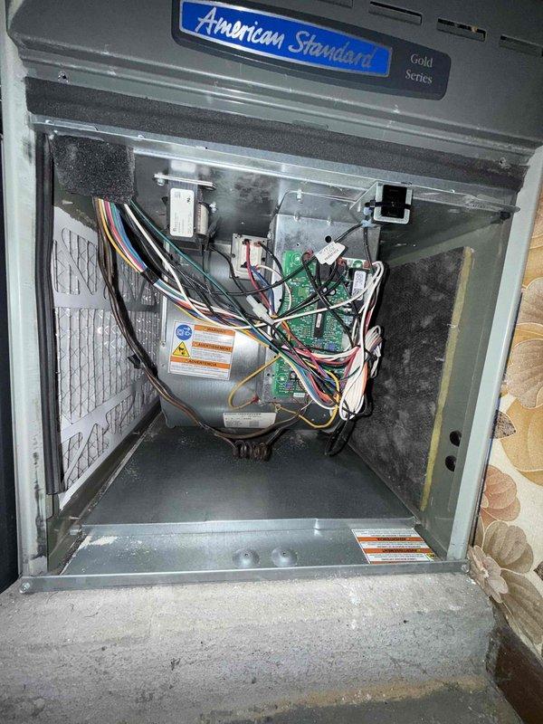 Completed comprehensive clean and check maintenance service on American Standard Gold Series air conditioning system per comfort plan agreement. Performed thorough inspection of all internal components including blower motor, control boards, and blower wheel assembly; verified proper operation of electrical connections and wiring harnesses; cleaned blower wheel and interior cabinet surfaces; confirmed system operational status with all components functioning within manufacturer specifications.