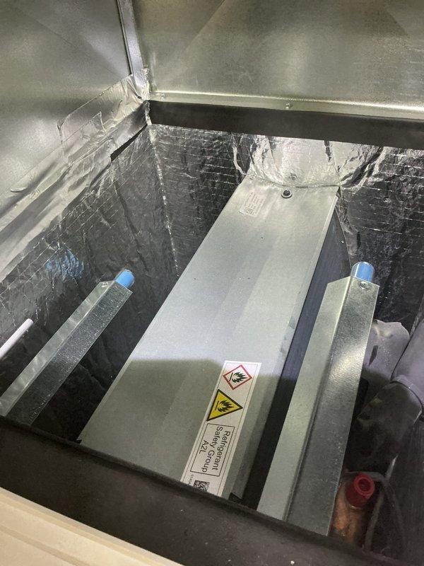 Mounted control panel for Solaris air purification system on second floor HVAC unit and disconnected and removed transformer from previously removed air scrubber. Coordinated with office for property management approval prior to completing installation work on commercial building system.