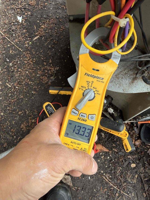 Completed air conditioning clean and check per maintenance agreement. Performed system diagnostics including supply air temperature verification at 92.2°F and electrical amperage measurement at 13.33 amps on outdoor condensing unit. System operating within normal parameters.