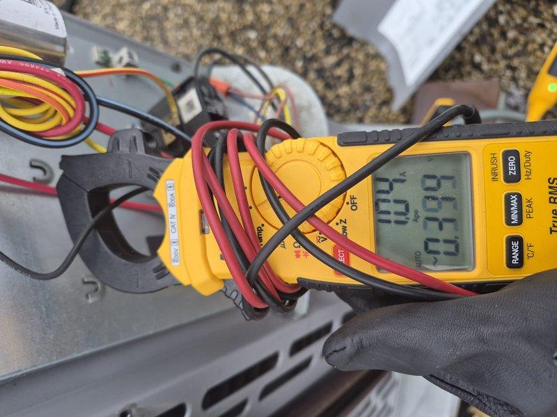 Performed comprehensive tune-up and maintenance on a residential split HVAC system with rooftop condensing unit and attic-mounted air handler. Conducted electrical diagnostics using digital multimeter to verify proper voltage and amperage readings at all major components including compressor, condenser fan motor, and blower motor. Inspected all electrical connections, control boards, and wiring harnesses for integrity and proper operation. Examined evaporator coil, refrigerant lines, and blower assembly within air handler cabinet. Replaced 12x20x1 air filter to ensure proper airflow and system efficiency. Verified all safety controls, capacitors, and contactors functioning within manufacturer specifications. System operating normally upon completion of tune-up service.