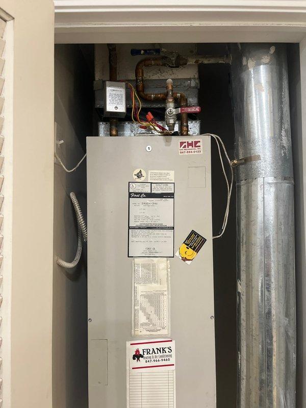 Completed HVAC estimate for 2-ton air conditioning system in condominium unit. Inspected existing air handler and associated mechanical equipment in utility closet, documented current installation including ductwork, condensate drainage system, and electrical connections. Provided pricing and recommendations for AC system replacement or service based on equipment assessment.