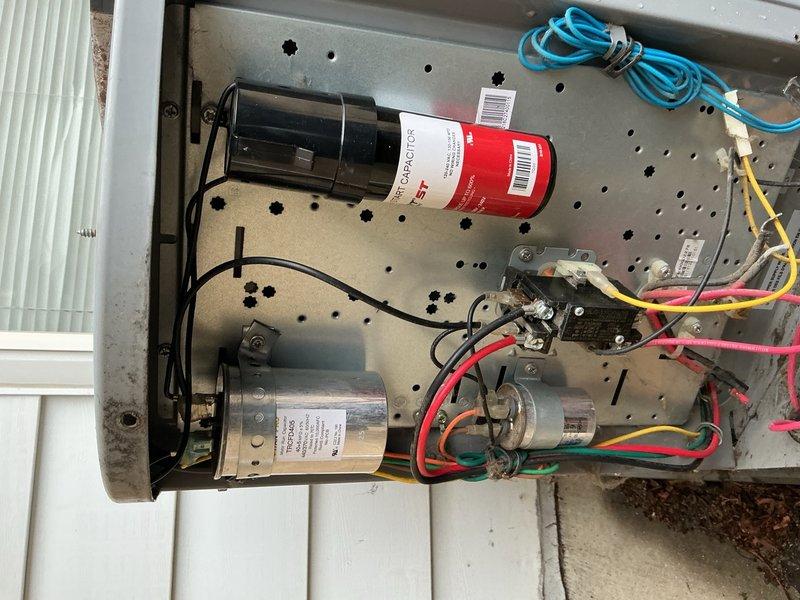 Responded to no-cool complaint on 8-year-old residential AC unit unable to maintain temperature below 76°F. Performed comprehensive electrical diagnostics using clamp meter and multimeter to test capacitor functionality and verify proper voltage and amperage readings across system components. Inspected contactor assembly, tested dual-run capacitor showing 53 microfarads on meter, and evaluated all electrical connections and wiring harnesses for proper operation.