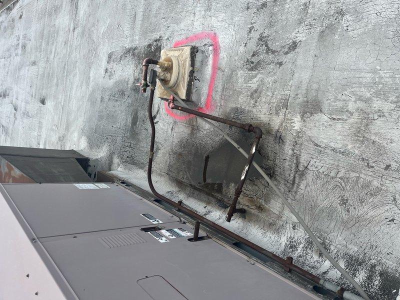 Verified refrigerant removal from two decommissioned rooftop units on Unit F, confirming proper recovery procedures had been completed. Removed gas lines from warehouse area, eliminated associated roof penetrations, and properly capped all gas line terminations at nearest accessible points inside the warehouse. Coordinated with lift equipment operator to safely access rooftop units and complete all demolition work.