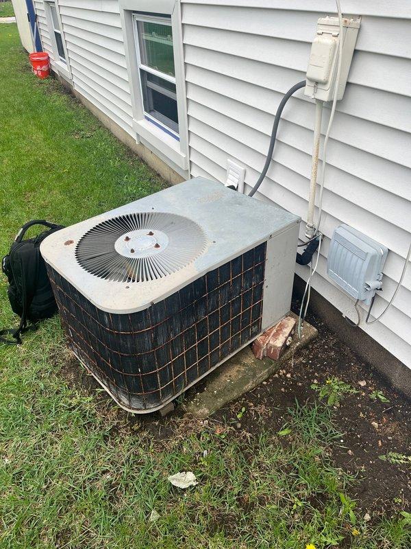 Completed estimate for full HVAC system replacement at residential property. Evaluated existing 34-year-old air conditioning condenser unit and gas furnace, both showing significant age-related wear and operational decline. Outdoor condenser unit exhibits weathering, discoloration, and compromised efficiency typical of equipment exceeding expected service life. Interior furnace components including gas valve assembly, burner assembly, blower motor, and draft inducer were inspected and documented. Provided comprehensive replacement options for complete system upgrade, discussed available financing programs, and documented existing equipment configuration including electrical disconnect, refrigerant lines, and current installation setup for accurate replacement specifications.