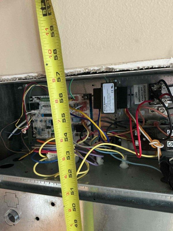 Responded to service call for non-functioning air conditioning system with thermostat communication issues. Upon inspection, found significant debris and dust accumulation on evaporator coil fins restricting airflow and system performance. Accessed control panel to diagnose thermostat connectivity and verified wiring connections and circuit board functionality. Documented equipment condition with measurements and photographic evidence. Cleaned evaporator coil to restore proper heat transfer efficiency. Discussed preventative maintenance options with customer to prevent future system failures and reviewed all equipment specifications for service records.