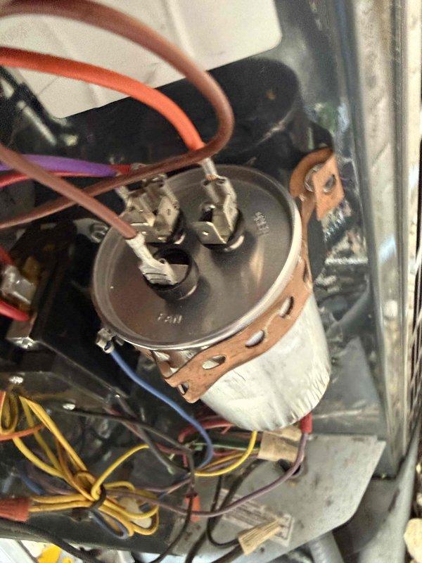 Responded to no-cooling call on 3-ton AC system (M# 4A7A3036H1000NA, S# 202537GF4F). Upon inspection, diagnosed failed dual-run capacitor in outdoor condensing unit. Capacitor showed visual signs of deterioration and tested out of specification. Replaced defective capacitor with properly rated unit, verified all electrical connections, and restored system to normal operation. Unit cooling properly upon departure.