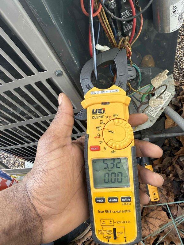 Completed comprehensive spring maintenance and clean-and-check service on two air conditioning systems per comfort plan agreement. Performed electrical diagnostics using digital multimeter and clamp meter, verifying amperage draws, voltage readings, and capacitor functionality on outdoor condenser units. Documented all equipment information with detailed photographs and confirmed systems are operating within manufacturer specifications for the cooling season.