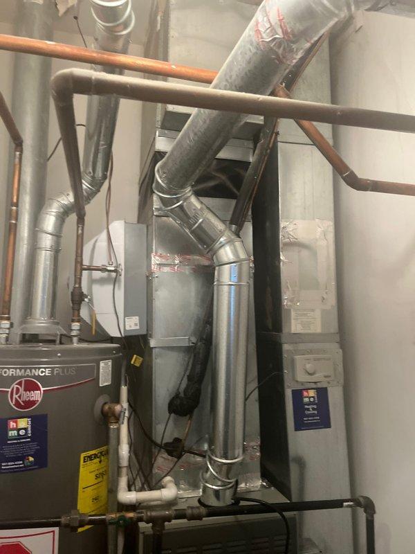 Responded to service call for 14-year-old air conditioning system experiencing operational concerns. Conducted comprehensive system evaluation and diagnostic assessment of existing HVAC equipment, including Rheem Performance Plus unit and associated ductwork. Documented current system configuration with photographs showing mechanical room layout, copper refrigerant lines, insulated ductwork, and electrical connections. Completed maintenance plan renewal process and provided customer with findings regarding system performance and replacement options for aging air conditioning equipment.