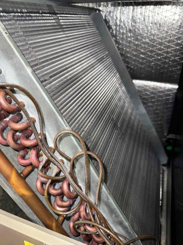 Completed air handler and air conditioning tune-up on single system. Performed diagnostic testing using digital multimeter to verify electrical components and system operation. Customer declined filter replacement service at this time.