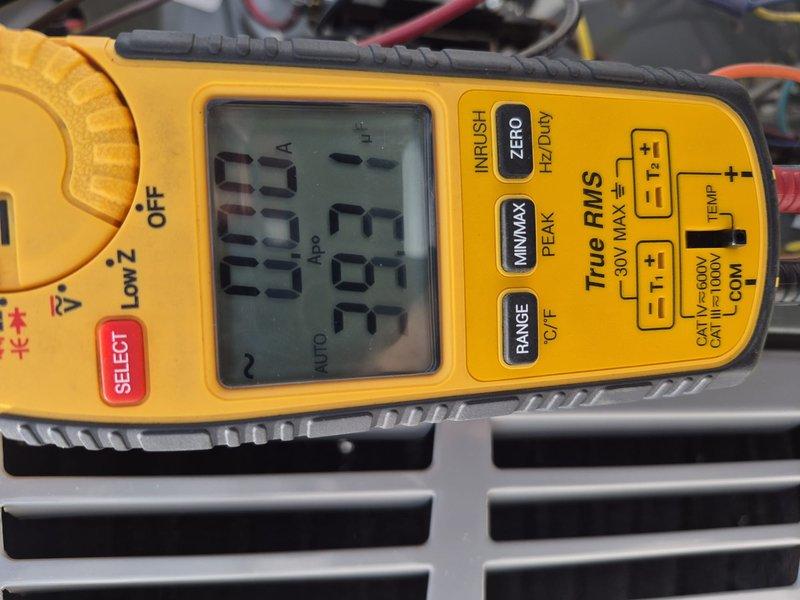 Completed routine HVAC tune-up and maintenance on single air conditioning system. Performed electrical diagnostics using clamp meter, recording amperage readings of 333A and 635A on system components. Measured refrigerant line temperatures with digital thermometer, documenting 57.3°F on suction line. Inspected copper refrigerant piping, noting minor surface oxidation but no active leaks. System operating within normal parameters. No filter replacement performed per service specifications.