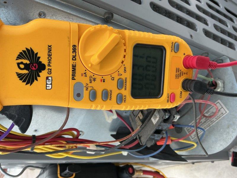 Completed comprehensive tune-up on single HVAC system including air conditioning and air handler units. Performed electrical diagnostics using digital multimeter to verify proper voltage and amperage readings across system components. Inspected outdoor condenser unit with operational fan assembly and verified all safety guards in proper position. Customer declined filter replacement service at this time, and system payment was collected upon completion.