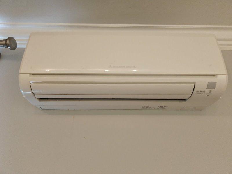 Completed preventative maintenance tune-up on two Mitsubishi ductless mini-split systems, approximately 6-10 years old, with one unit located in the kitchen and one in the bedroom. Performed standard inspection, cleaning, and testing procedures on both indoor wall-mounted evaporator units and outdoor condensing units, utilizing ladder for access to exterior components. Verified R-410A refrigerant levels, checked electrical connections, cleaned filters and coils, tested operational performance, and confirmed both systems are functioning properly.