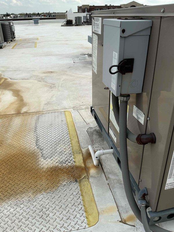 Responded to service call for rooftop unit serving hallway area with reported hot and stuffy conditions. Upon arrival, accessed rooftop equipment and performed diagnostic assessment of the non-operational RTU. Inspected electrical control panel, examining circuit boards, relay components, and associated wiring connections for proper operation. Identified control system issue preventing unit from operating correctly. Completed necessary repairs to restore cooling function to the affected hallway zone, ensuring proper airflow and temperature control were reestablished.