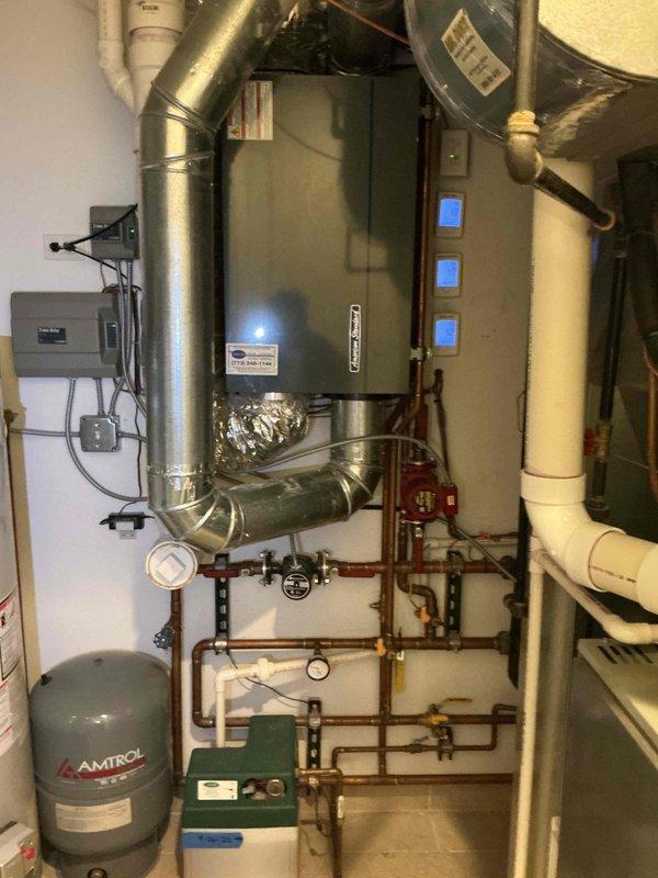 Conducted on-site evaluation of existing HVAC system to assess air conditioning performance and determine replacement needs. Inspected indoor air handler unit with associated ductwork and mechanical room components, as well as rooftop condenser units. Provided comprehensive estimate for air conditioning replacement with option to include furnace replacement as a complete system upgrade.