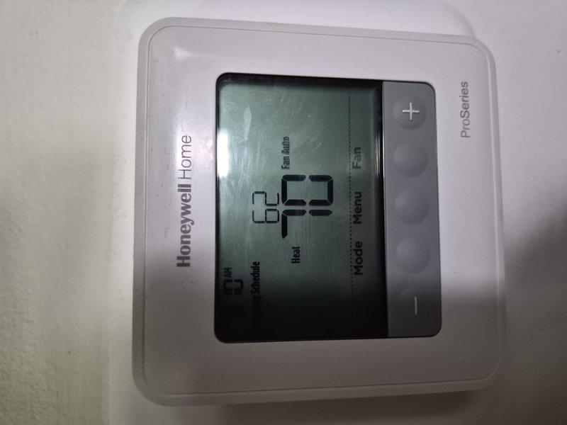Completed air conditioning clean and check maintenance service per scheduled comfort plan agreement. Performed comprehensive system inspection, verified thermostat operation and programming settings, and documented current weather conditions showing ambient temperature of 45°F. All system components found operating within normal parameters with no immediate service needs identified.