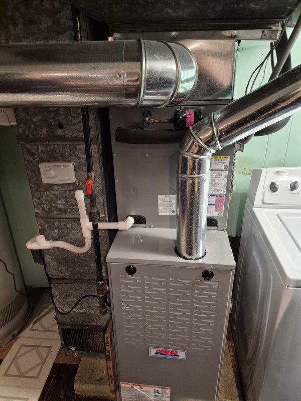 Responded to emergency service call for gas furnace that had been shut down by utility company due to detected gas leak. Upon arrival, performed comprehensive leak detection inspection of 2-3 year old gas furnace system, including all gas line connections, threaded fittings, and shut-off valves. Located leak at gas supply connection point near furnace unit. Tightened compromised threaded fitting and replaced faulty gasket at connection. Performed pressure test on gas line to verify integrity of repair. Conducted combustion analysis and verified proper gas valve operation. Inspected condensate drain system and PVC drainage lines for proper function. Restored gas supply, performed ignition sequence test, and monitored furnace through complete heating cycle. Confirmed no gas leaks present using electronic leak detector at all connections and fittings. Verified proper airflow through ductwork and checked all safety controls for proper operation. System returned to safe, normal operation wi